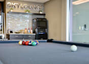 Thumbnail 9 of 35 - Enjoy a game of pool in our Sky Lounge rooftop amenity.