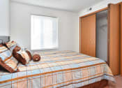 Thumbnail 18 of 27 - Bedroom With Expansive Windows at Ross Estates Apartments, MRD Conventional, Lawton, Oklahoma