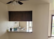 Thumbnail 5 of 10 - a view of the kitchen from the living room