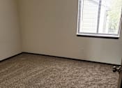 Thumbnail 7 of 10 - an empty room with a window