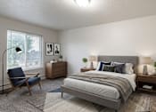 Thumbnail 5 of 11 - A bedroom with a large bed, a chair, and a nightstand.