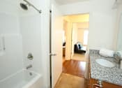 Thumbnail 12 of 16 - Bathroom With Bathtub at Withington Apartments, Jackson, MI