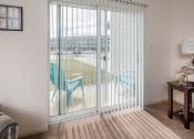 Thumbnail 5 of 40 - Living room window looking out  at Benson Estates Apartments, AUGUSTA, GA, 30815