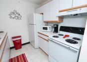 Thumbnail 11 of 21 - Kitchen at Boggan Estates Apartments in Tupelo, MS