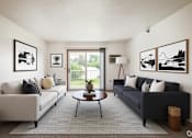 Thumbnail 5 of 14 - A living room with two couches and a coffee table.