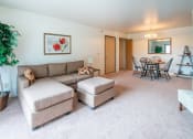 Thumbnail 7 of 23 - Living Room With Kitchen at Custer Estates Apartments, Michigan