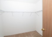 Thumbnail 18 of 22 - Master Closet  at Eddins Estates Apartments, Alabama, 35453