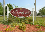Thumbnail 1 of 22 - Welcoming Property Sign at Hornbrook Estates Apartments, Evansville, Indiana