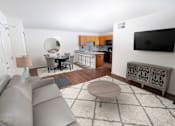 Thumbnail 4 of 12 - Modern Living Room With Television at Gray Estates  Apartments, MRD Conventional, St Clair MI 48079