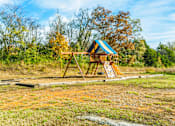 Thumbnail 11 of 20 - Outdoor Play Area Davis Estates Apartments in Shelbyville TN