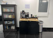 Thumbnail 36 of 36 - a coffee kiosk in the lobby of a library