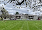 Thumbnail 4 of 16 - Exterior Franklin North Apartments 300 Riverwind Dr Dewitt, MI 48820