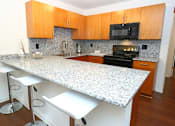 Thumbnail 8 of 16 - Gourmet Kitchen at Withington Apartments, Jackson, MI, 49201
