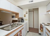 Thumbnail 15 of 21 - Full Equipped Kitchen at Geary Estates Apartments, MRD Conventional, Kansas, 66441