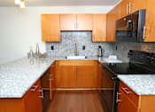 Thumbnail 7 of 16 - Fully Furnished Kitchen at Withington Apartments, Michigan, 49201