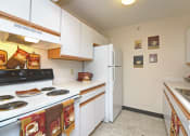 Thumbnail 16 of 21 - Fully Equipped Kitchen With Modern Appliances at Geary Estates Apartments, MRD Conventional, Kansas