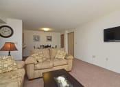Thumbnail 18 of 21 - Living Room With Television at Geary Estates Apartments, MRD Conventional, Grandview Plaza, 66441