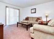 Thumbnail 24 of 27 - Living Room With Expansive Window at Ross Estates Apartments, MRD Conventional, Lawton, 73505