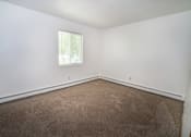 Thumbnail 5 of 10 - an empty room with carpet and a window