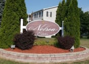 Thumbnail 1 of 16 - Welcoming Property Sign at Nelson Estates Apartments,1815 Raleigh Ave, Kendallville, IN 46755Apartments, Kendallville, IN