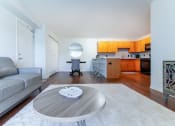 Thumbnail 6 of 24 - Living Room With Kitchen at Oliver Apartments, Temperance, Michigan