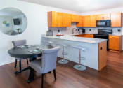 Thumbnail 10 of 24 - Eat In Kitchen at Oliver Apartments, Temperance, MI, 48182