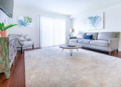 Thumbnail 5 of 24 - Carpeted Living Area at Oliver Apartments, Michigan