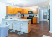 Thumbnail 2 of 9 - Gourmet Kitchen at Fuller Apartments, Ohio, 43551