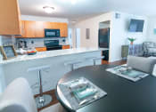 Thumbnail 5 of 9 - Dining And Kitchen at Fuller Apartments, Perrysburg