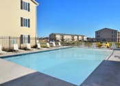 Thumbnail 8 of 27 - Invigorating Swimming Pool at Ross Estates Apartments, MRD Conventional, Lawton, OK, 73505
