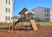 Thumbnail 9 of 27 - Tot Lot And Playing Field at Ross Estates Apartments, MRD Conventional, Lawton, OK