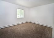 Thumbnail 11 of 11 - an empty room with carpet and a window