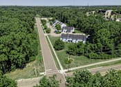 Thumbnail 3 of 24 - Aerial View Of Property With Surroundings at Raleigh House Apartments, MRD Apartments, East Lansing