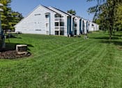 Thumbnail 10 of 24 - Lush Green Outdoors at Raleigh House Apartments, MRD Apartments, Michigan