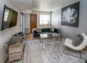 Thumbnail 23 of 24 - Modern Living Room at Raleigh House Apartments, MRD Apartments, East Lansing