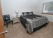 Thumbnail 18 of 24 - Spacious Bedroom With Comfortable Bed at Raleigh House Apartments, MRD Apartments, East Lansing, 48823