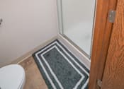 Thumbnail 21 of 24 - Walk In Showers With Built In Bench And Glass Enclosure at Raleigh House Apartments, MRD Apartments, Michigan, 48823