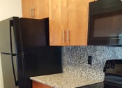 Thumbnail 6 of 21 - Upgraded Kitchen at Geary Estates Apartments, MRD Conventional,  Grandview Plaza, Kansas