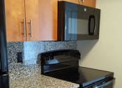 Thumbnail 7 of 21 - Upgraded Kitchen at Geary Estates Apartments, MRD Conventional, Kansas