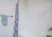 Thumbnail 22 of 43 - Bathroom Shower  at Walker Estates Apartments, Augusta, GA, 30906