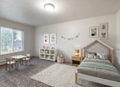 Thumbnail 6 of 10 - A bedroom with a bed, a table and chairs, and a window.
