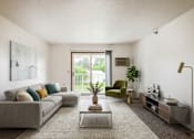 Thumbnail 1 of 10 - A living room with a grey couch, a green armchair, a coffee table, and a large window.