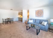 Thumbnail 4 of 33 - Modern Living Room at Woodbury Estates Apartments, Adrian