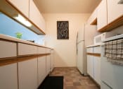 Thumbnail 12 of 33 - Spacious Kitchen at Woodbury Estates Apartments, Adrian, MI