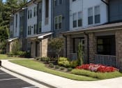 Thumbnail 3 of 19 - Walton Harbor apartment homes in Gainesville, Georgia tree-lined streets