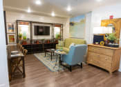 Thumbnail 37 of 40 - a living room filled with furniture and a flat screen tv
