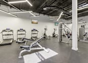 Thumbnail 4 of 38 - a gym with cardio machines and other exercise equipment at chestnut