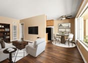 Thumbnail 2 of 18 - a living room with a couch and a table