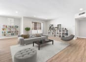 Thumbnail 2 of 38 - a living room with a couch and a coffee table