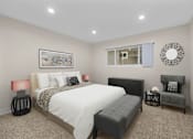 Thumbnail 36 of 69 - a bedroom with a bed and a window at Lombardi Apartments, Woodland Hills, CA, 91367